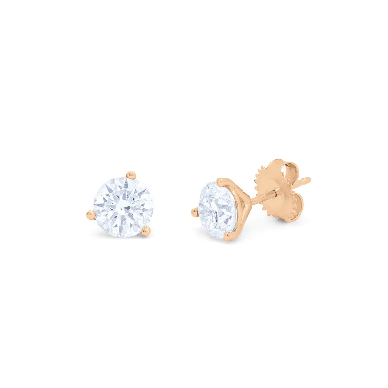 14kt rose gold solitaire diamond stud earrings containing 2.00 cts tw of round diamonds set in a martini setting